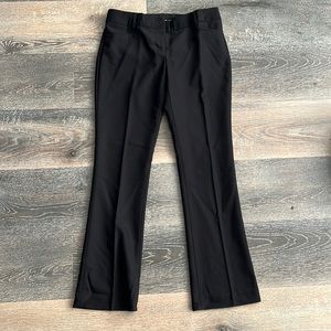 Women’s Express black low rise boot leg slacks in 4S